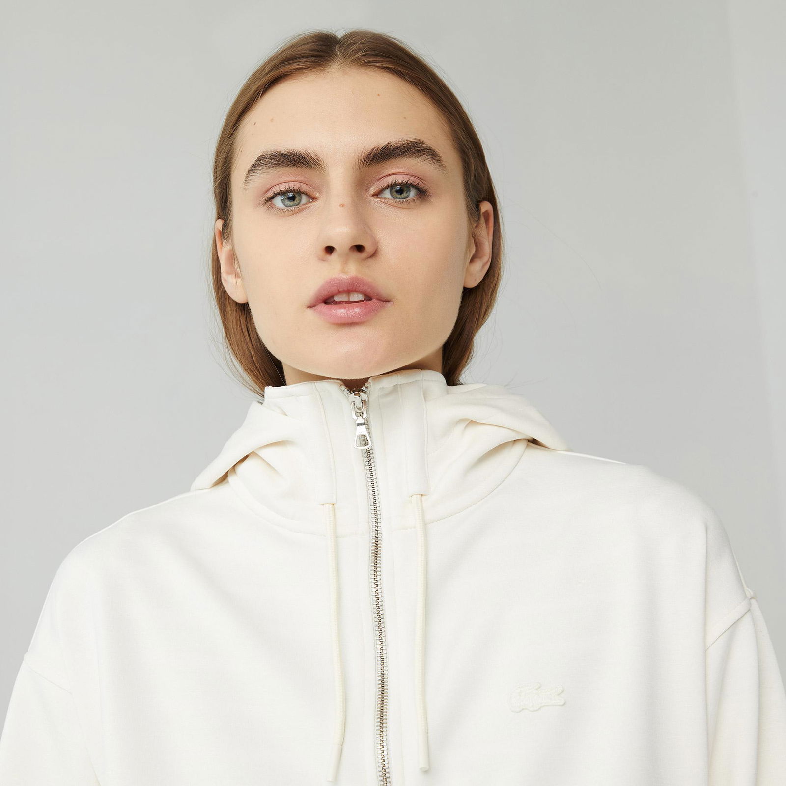 Lacoste Női kapucnis pulóver laza cipzárral