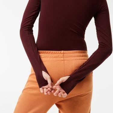  Lacoste Active Kadın Slim Fit Uzun Kollu Yarım Fermuarlı Desenli Bordo Body